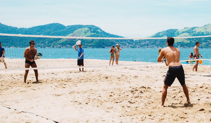 People playing beach tennis in Brazil